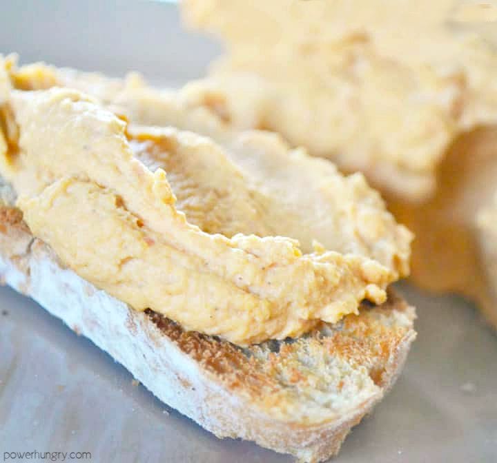oil-free hummus spread thick on a slice of toasted bread
