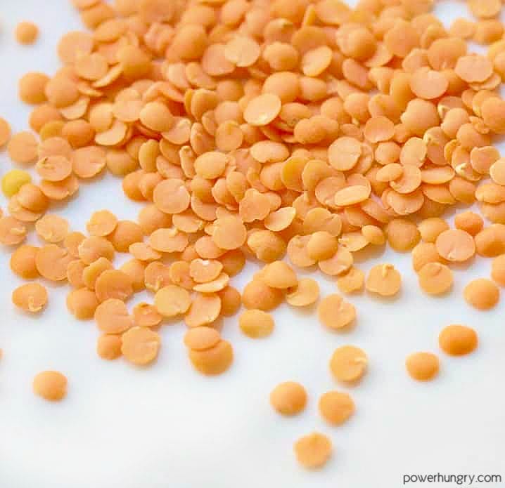 split red lentils on a white plate