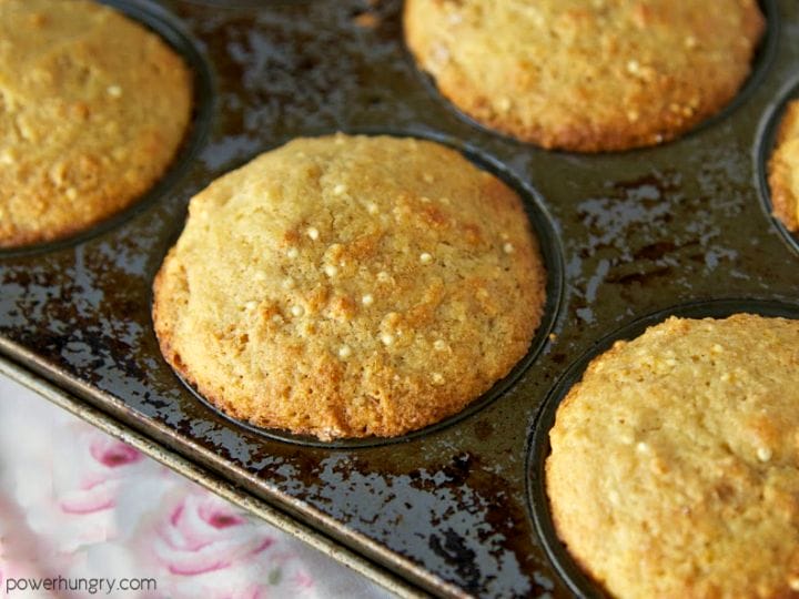 banana millet muffins in a metal muffin tin