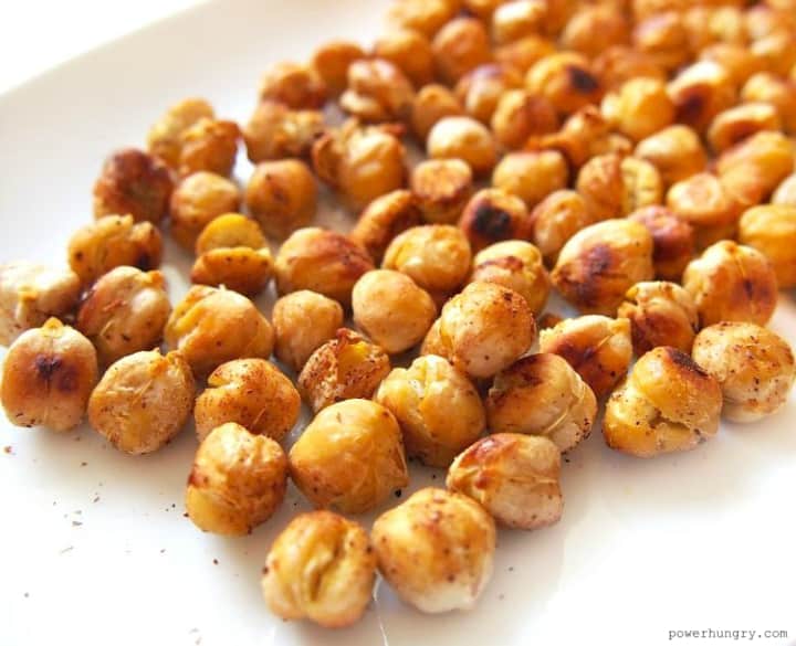 close up of oil-free crispy roasted chickpeas on a white plate