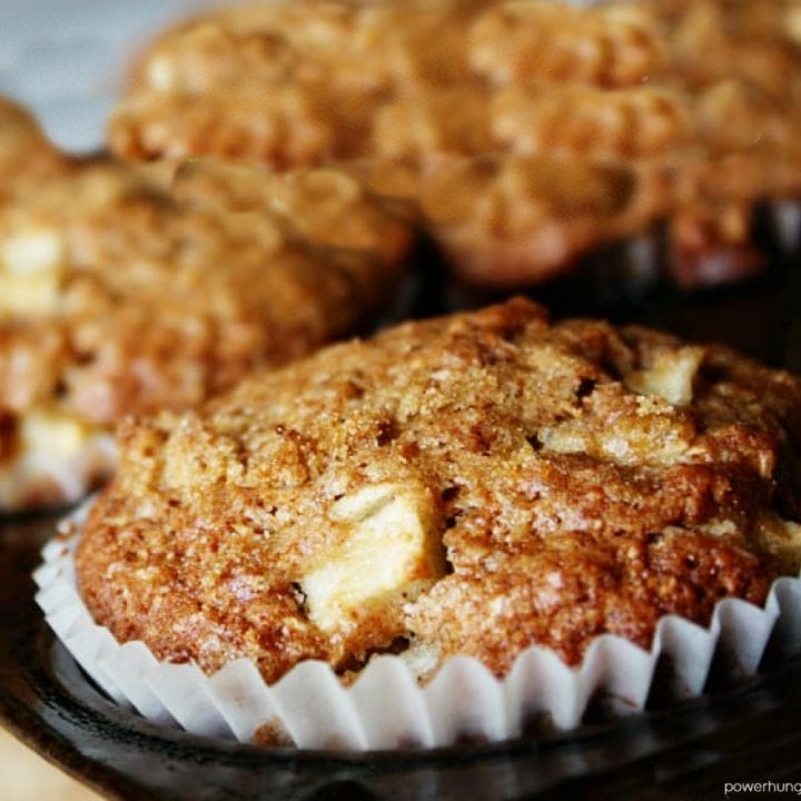 close-up of apple cinnamon coconut flour muffins in a muffins tin