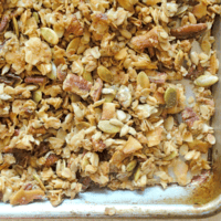 sheet pan covered with high protein banana bread granola