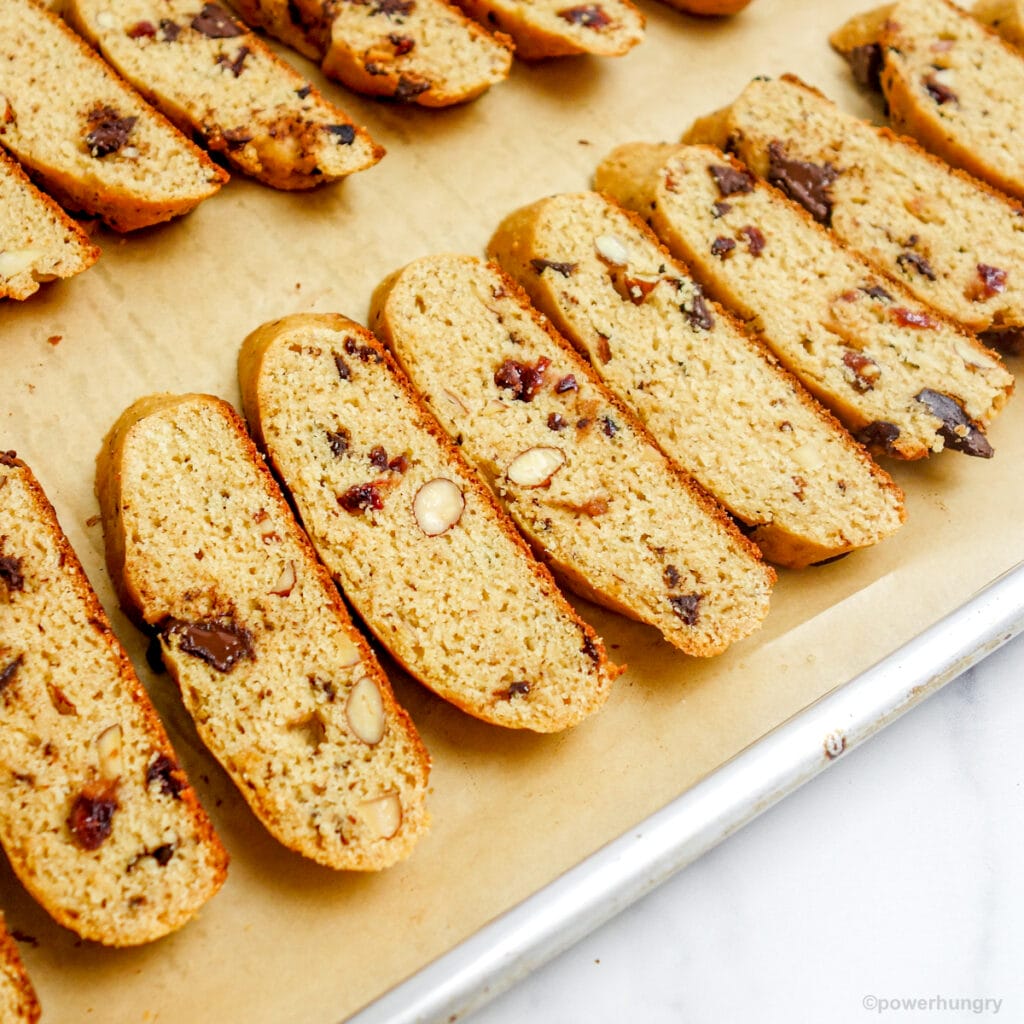 slices of biscotti on a baking sheet. ready for a second bake