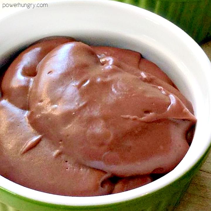 avocado chocolate pudding in a green and white dish
