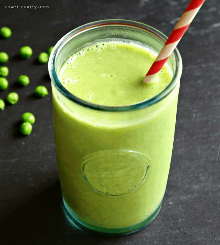 Green pea citrus smoothie with straw