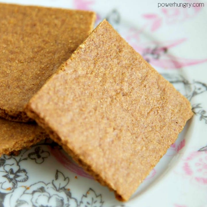 almond flour graham crackers on a white, grey and pink china plate