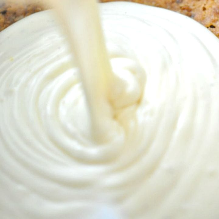 vegan cshew cheesecake filling being poured into a no-bake crust