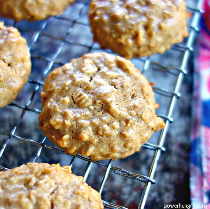 vegan peanut butter oat protein cookies on a wire cooling rack