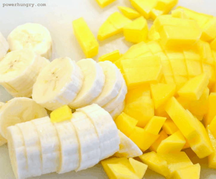 close-up of sliced bananas and diced mango