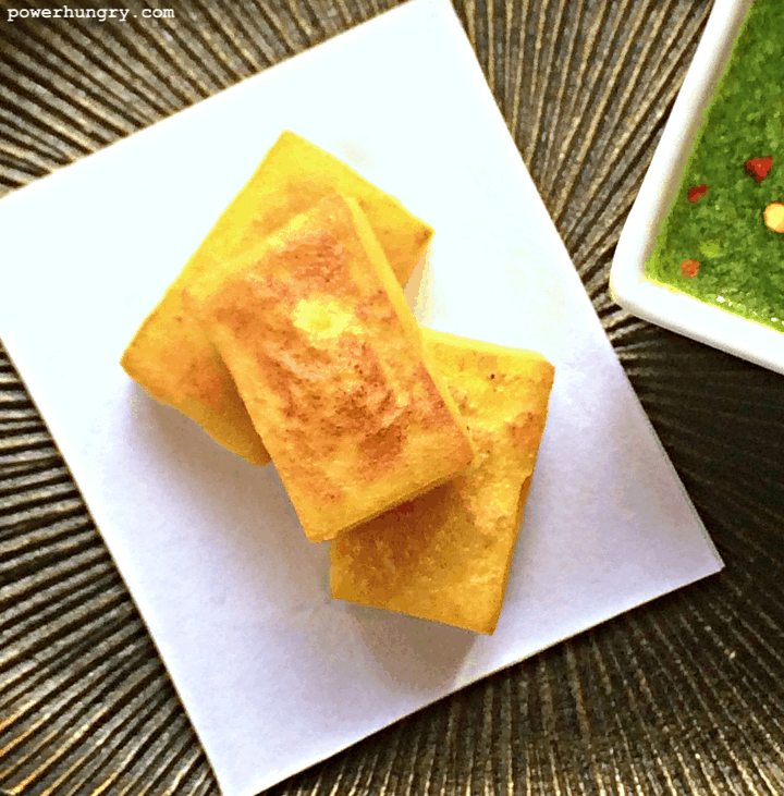 close-up of Burmese tofu (made with chickpea flour) on a grooved metal plate