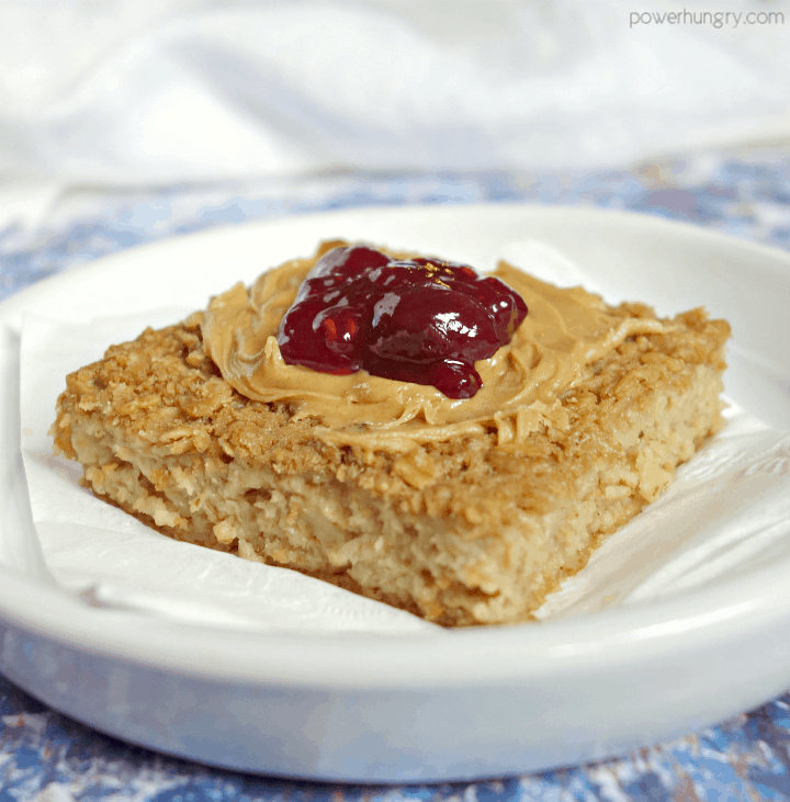 Vegan Coconut Baked Oatmeal Square topped with peanut butter and jelly
