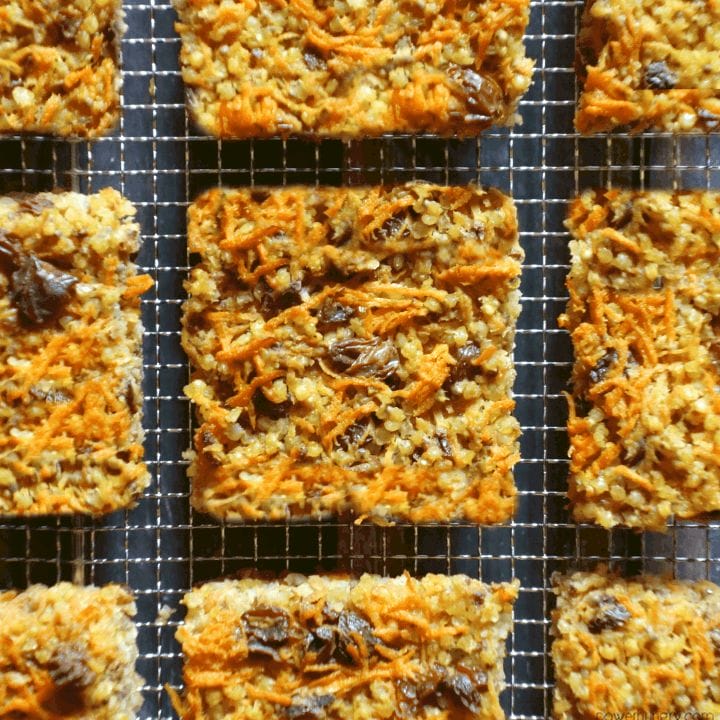 carrot cake millet bars, cut into squares and placed on a wire rack