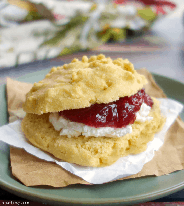 grain-free drop biscuit, split open and filled with jam