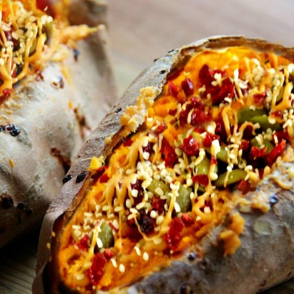 4-ingredient stuffed breakfast sweet potatoes, loaded with nut butter, seeds and dried fruit