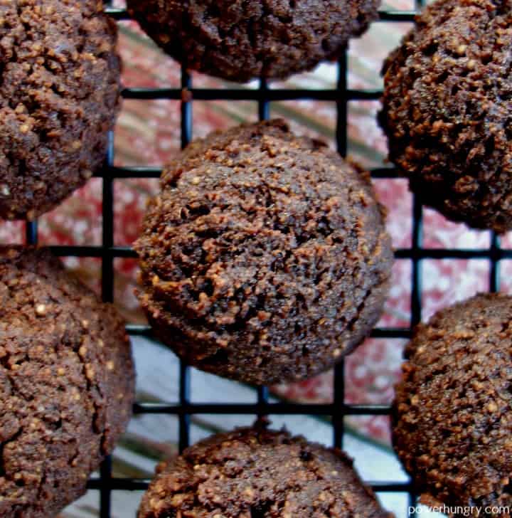 close-up chocolate coconut flour cookies on a black cooling rack