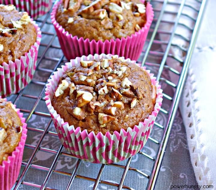 Hummingbird Muffins {Grain-free | Vegan} In pink paper liners on top of a silver cooling rack