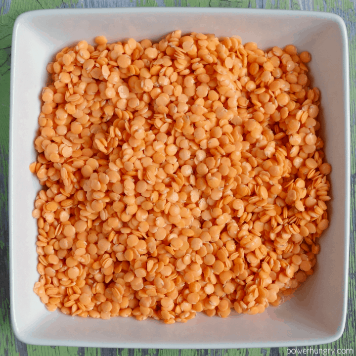 white bowl filled with soaked red lentils