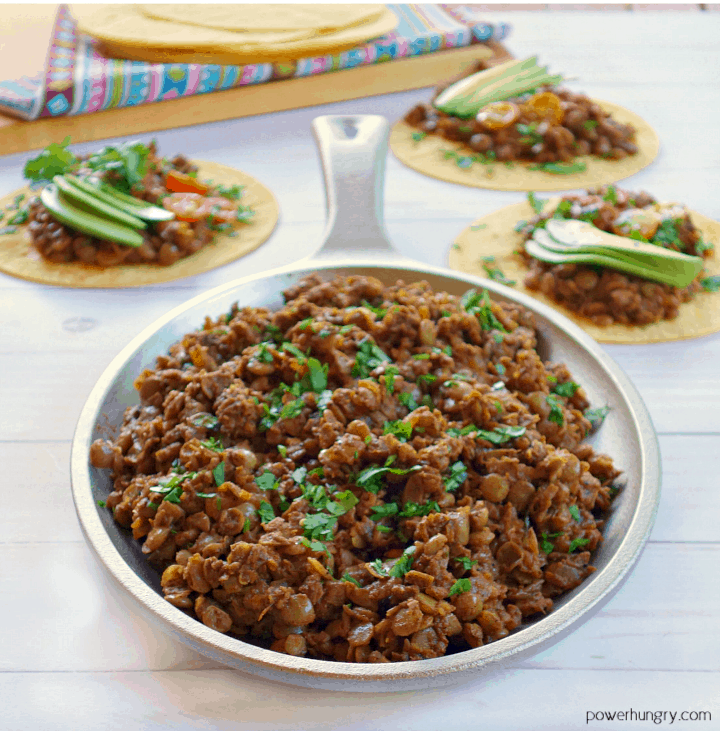 Vegan Lentil Taco Meat in a sillet with more behind.
