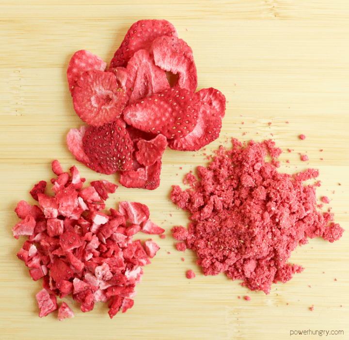 overhead shot of freeze dried strawberries, whole, chopped and crushed