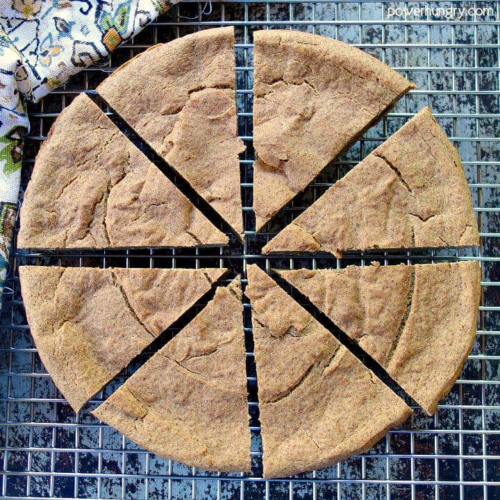 overhead shot of sliced 2-ingredient lentil flax bread on wire cooling rack