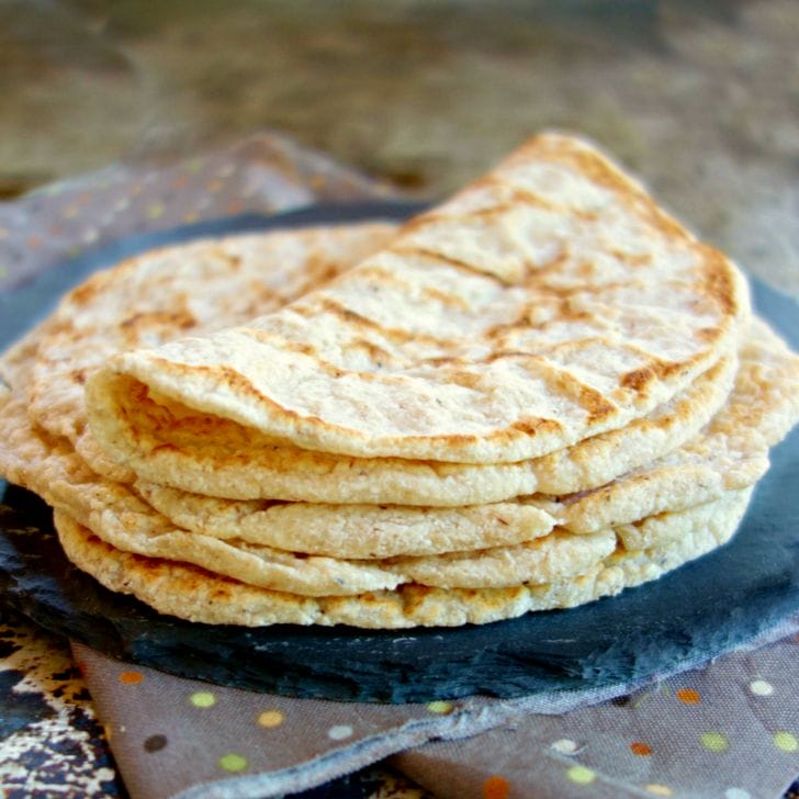 stack of 2 ingredient Coconut Flour Tortillas on a slate plate