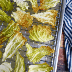 baked cabbage chips on a baking rack