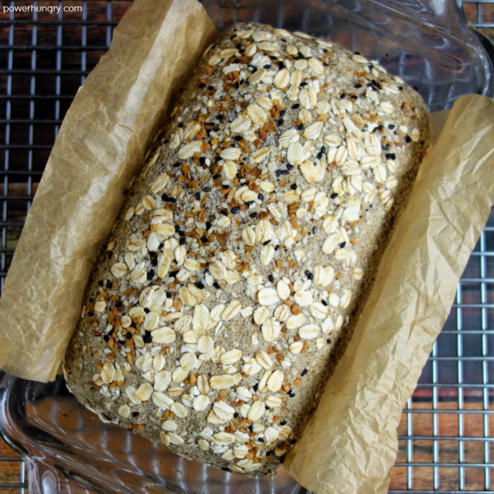 buckwheta bread in a baking pan, cooling on a wire cooling rack