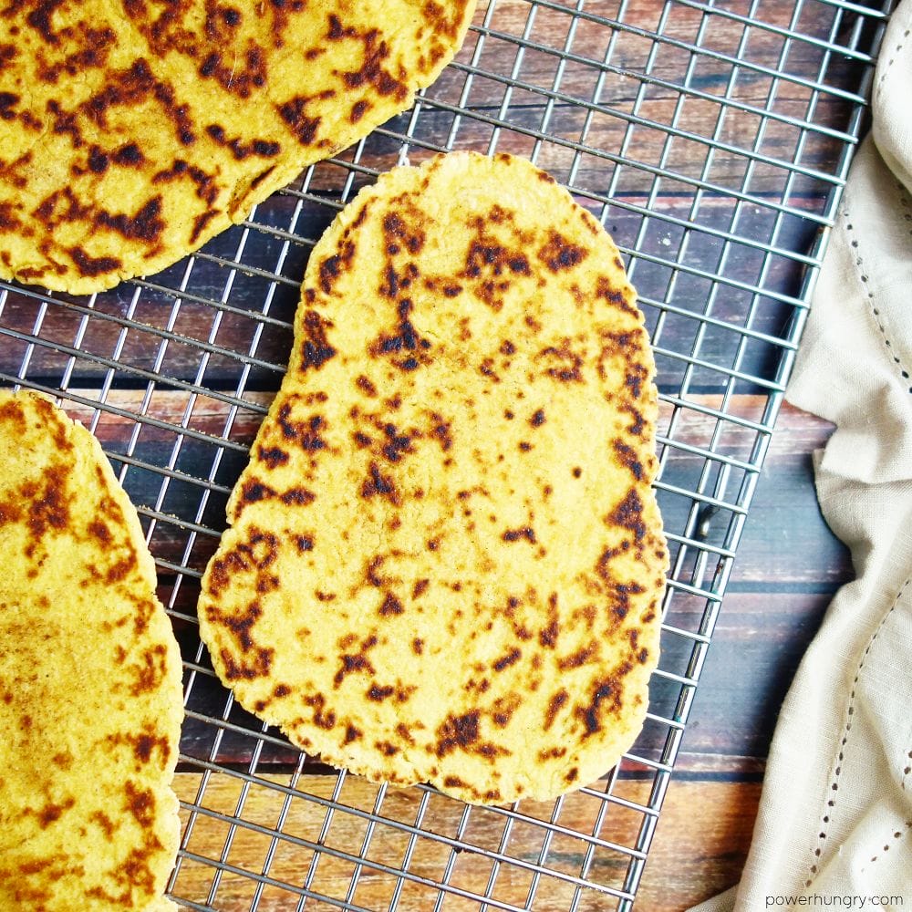 chickpea flour naan on a wire cooling rack