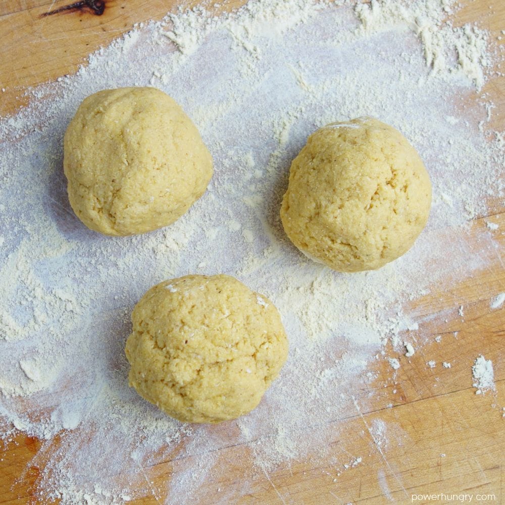 chickpea flour naan dough divided into three equal portions