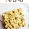 Square of Vegan Coconut Flour Flax Focaccia on white parchment paper
