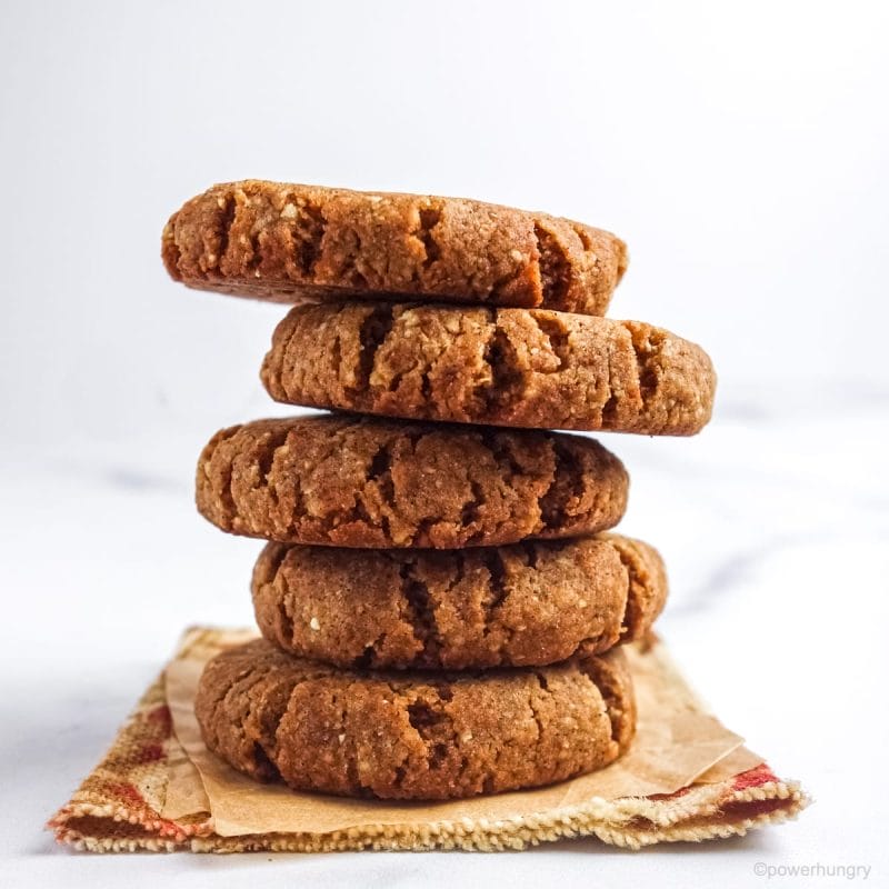 a stack of 5 tiger nut flour cookies on a fabric napkin