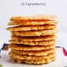 pinterest image of a stack of almond flour crackers on a blue floral napkin