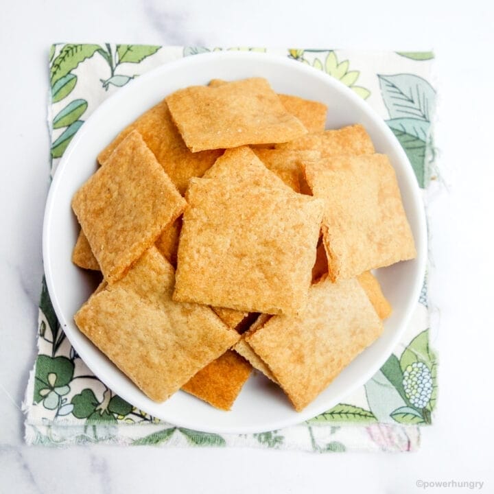 overhead shot of cassava flour crackers in a white dish