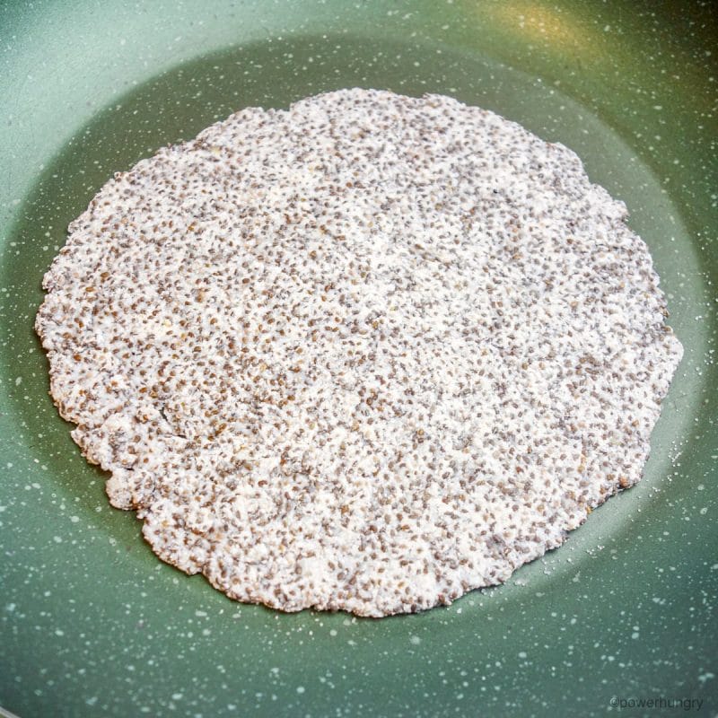 cooking chia coconut tortilla in a skillet