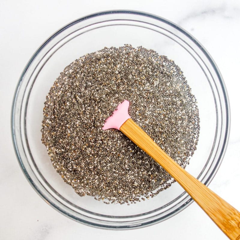 a glass bowl fill with chia seeds and water