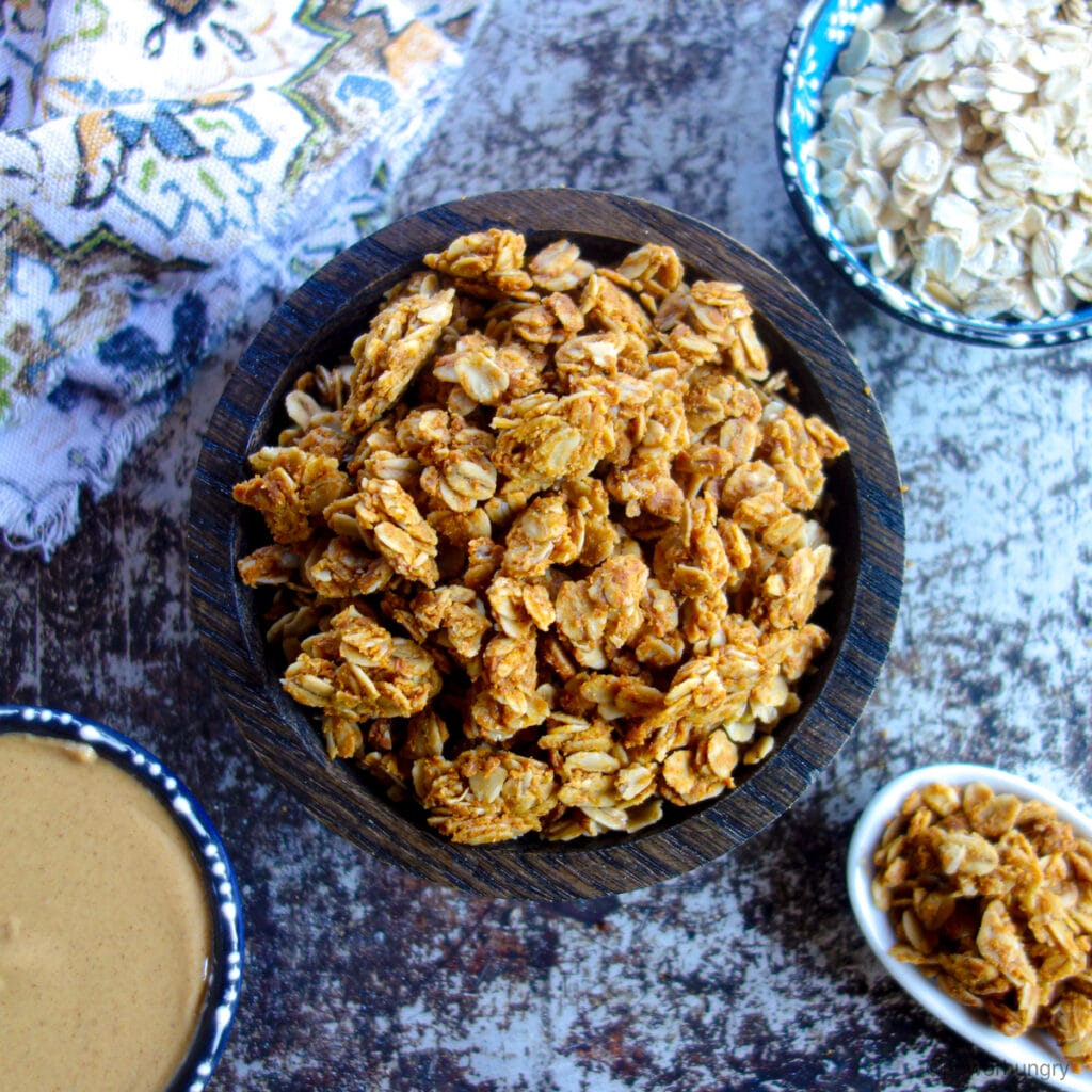 peanut butter granola in a wooden bowl