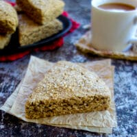 gingerbread scones and a cup of tea on a mottled slate surface