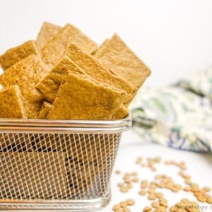 small metal basket filled with lentil crackers