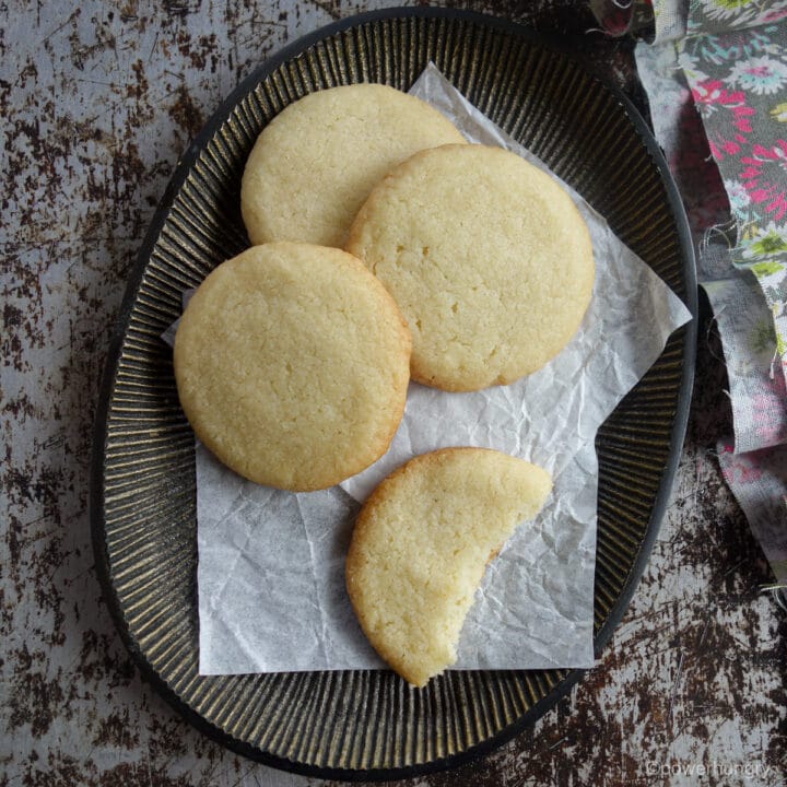 vegan almond flour sugar cookies on a metal plate