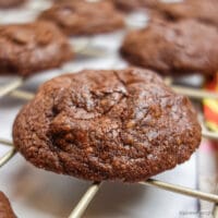 chocolate avocado cookie on a cooling rack